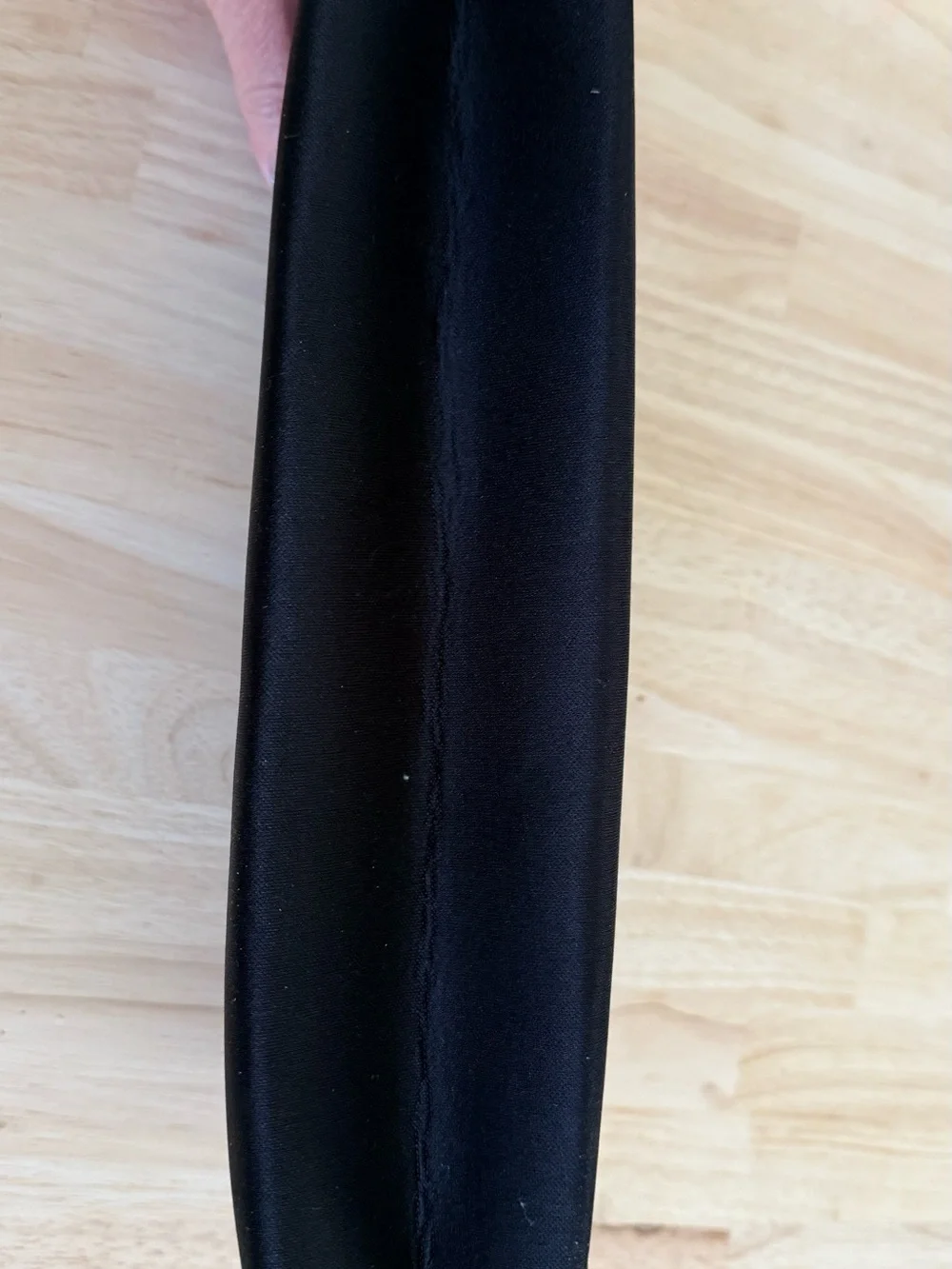 SKIMS Black Neoprene Toiletry Pouch with Raised Logo